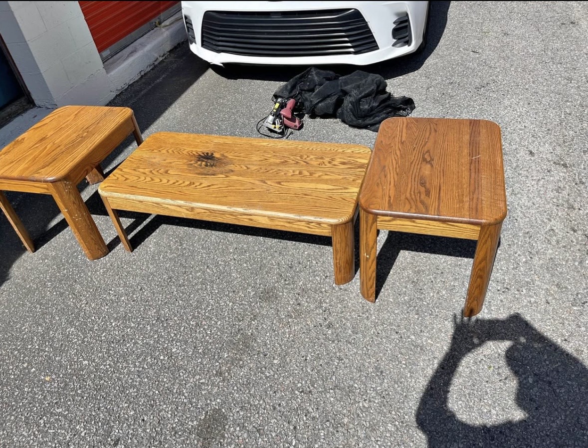 Solid oak coffee and end tables before restoration