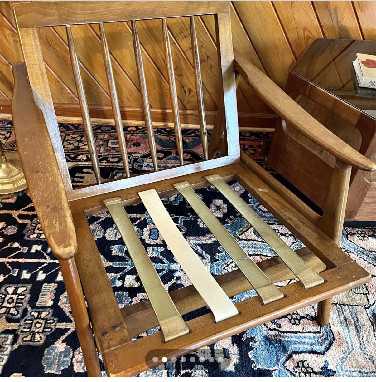 Vintage Scandinavian modern spindle-back lounge chair awaiting restoration